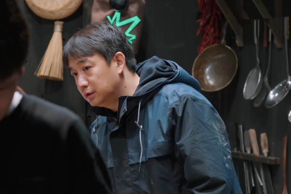 看破何炅